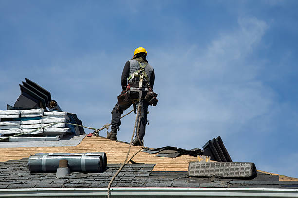 Professional Roofing technician working in Mc Connellsville, NY